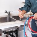 What must you make sure of when you are hiring a plumber?
