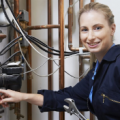 Why is it highly advisable to call a professional, licensed plumber?