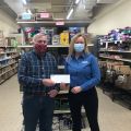 Lapels Dry Cleaning Makes Donation to Marshfield Food Pantry